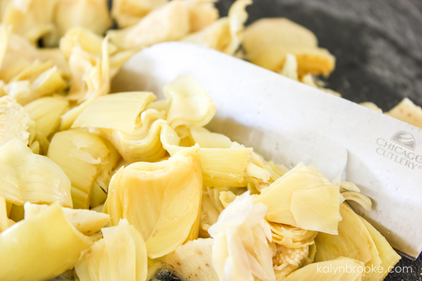 Step 1: Drain and chop the artichoke hearts