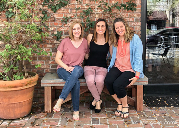 three women sitting together, friends