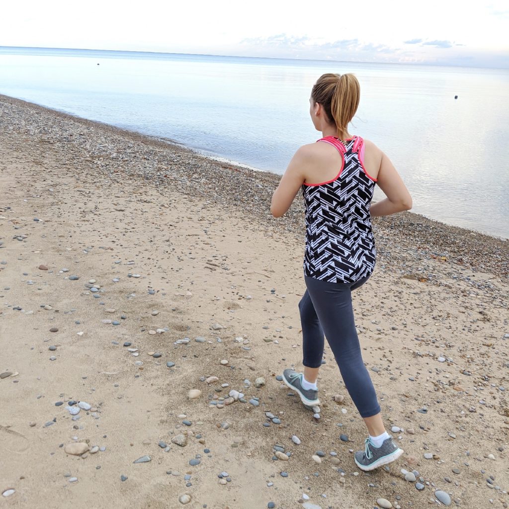 woman running on the beach